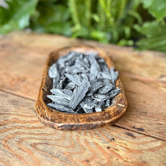 Rough Black Kyanite Crystal - A powerful crystal for energy clearing and alignment. Embrace the grounding and protective properties of Black Kyanite.