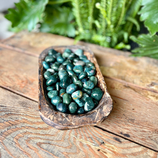 Bloodstone Tumbled Crystal - Known for its revitalizing energy, Bloodstone is believed to enhance strength and courage. Carry this tumbled stone for vitality and resilience.