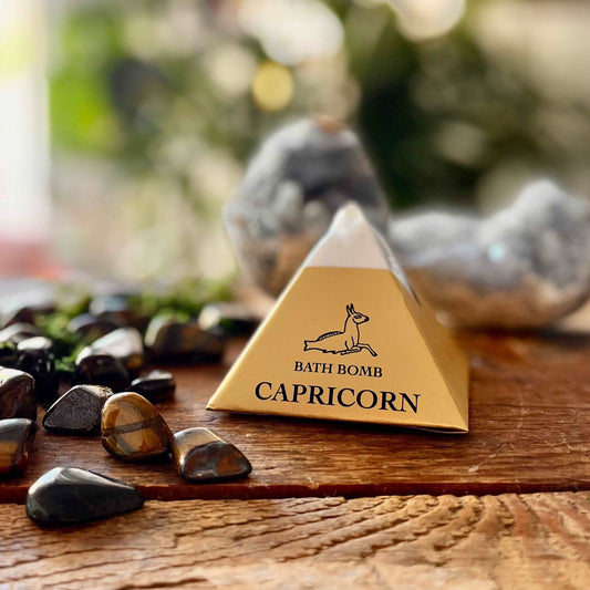 Elevate your self-care routine with our Capricorn Bath Bomb. Crafted with intention and infused with organic essential oils of Orange, Cedar, and Pine, this bath bomb offers a grounding and empowering experience. Immerse yourself in the luxurious scents and nourishing ingredients, allowing them to create a harmonious atmosphere that aligns with Capricorn's stability and strength. Embrace the grounding energy of Capricorn in your bath ritual with this empowering bath bomb.