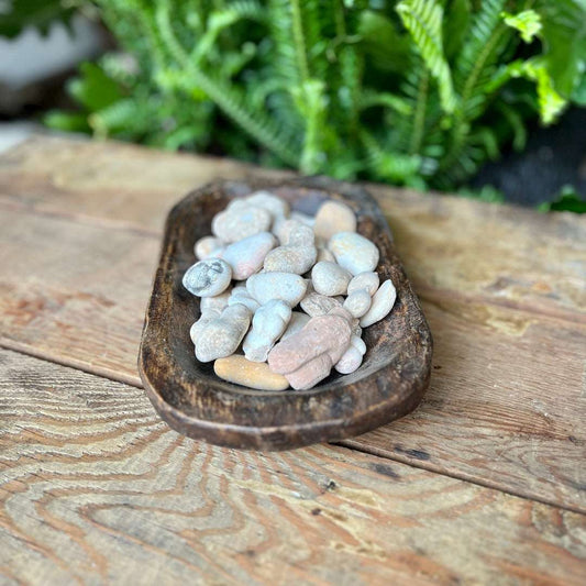 Fairy Stone - Connect with the magical energies of Fairy Stone. Also known as Goddess Stones, these naturally occurring staurolite crystals are thought to bring good luck, protection, and a touch of enchantment.
