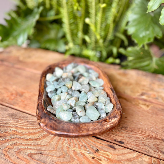 Prehnite Tumbled Crystal - Invite the gentle energies of Prehnite. Known for its heart-opening qualities, Prehnite is believed to enhance intuition and bring peace. Embrace the soothing vibes of Prehnite in your crystal rituals.