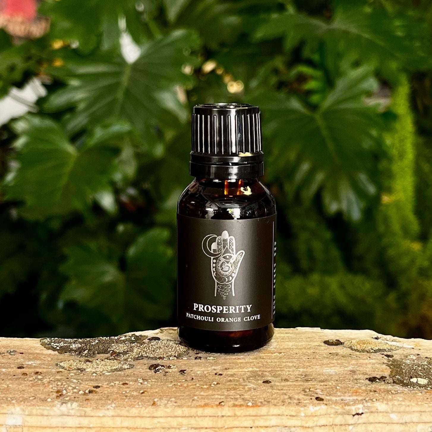 0.5 oz Prosperity Essential Oil Blend with a Proprietary Blend of Organic Essential Oils, Organic Fractionated Coconut Oil, and a Crystal Charged Under the Moon for Abundance and Manifesting Goals