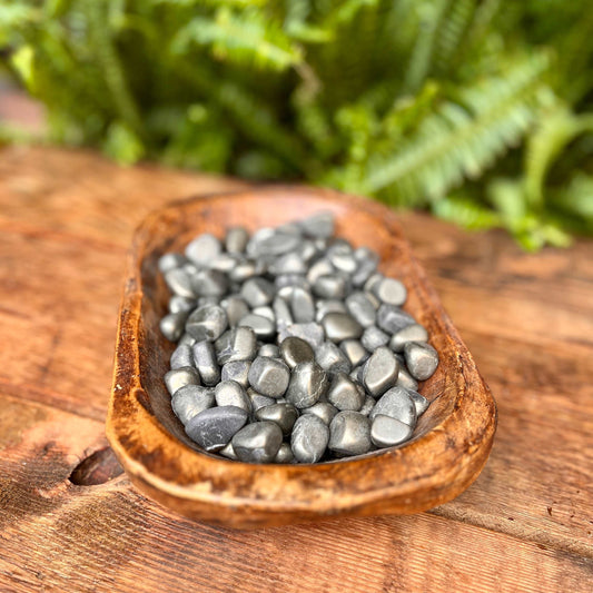 Pyrite Tumbled Crystal - Attract abundance with Pyrite. This golden crystal is associated with prosperity and manifestation, making it a powerful companion for those seeking wealth and success. Let the energies of Pyrite spark positive transformations.