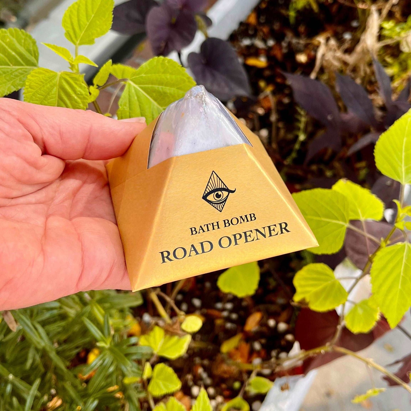 Open new paths and possibilities with our Road Opener Bath Bomb. Crafted with organic essential oils of Lemongrass, Basil, and Peppermint, this bath bomb is designed to usher in positive energy and clarity. Immerse yourself in the refreshing scents, allowing them to inspire a sense of openness and renewal. Luxuriate in the soothing waters and embrace the potential for a clear and invigorated mindset.
