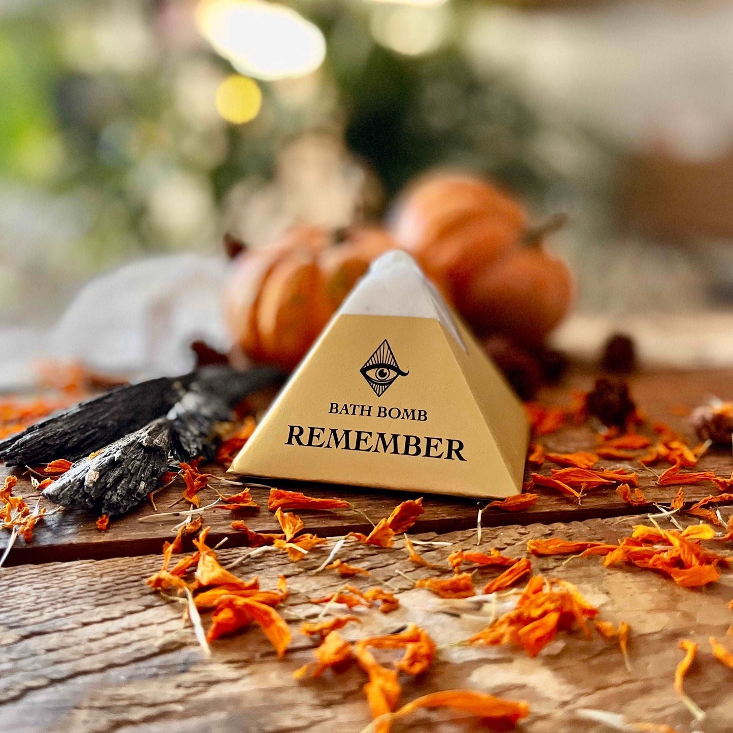 Indulge in the enchanting energy of our Samhain | Remember Bath Bomb, crafted with a bewitching blend of Patchouli, Orange, and Cedar organic essential oils. Embrace the mystical allure as you soak in the warm and comforting fragrance, evoking the essence of the Samhain season. Allow the soothing properties of this bath bomb to guide you into a realm of relaxation and reflection.